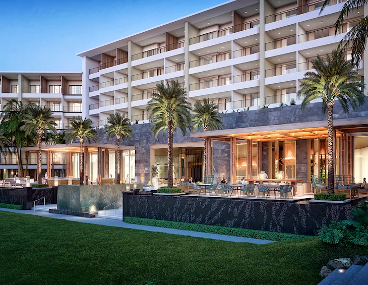 Bluebay Hotel luxury hotel exterior at sunset